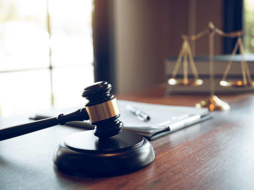 Gavel sitting on a desk.